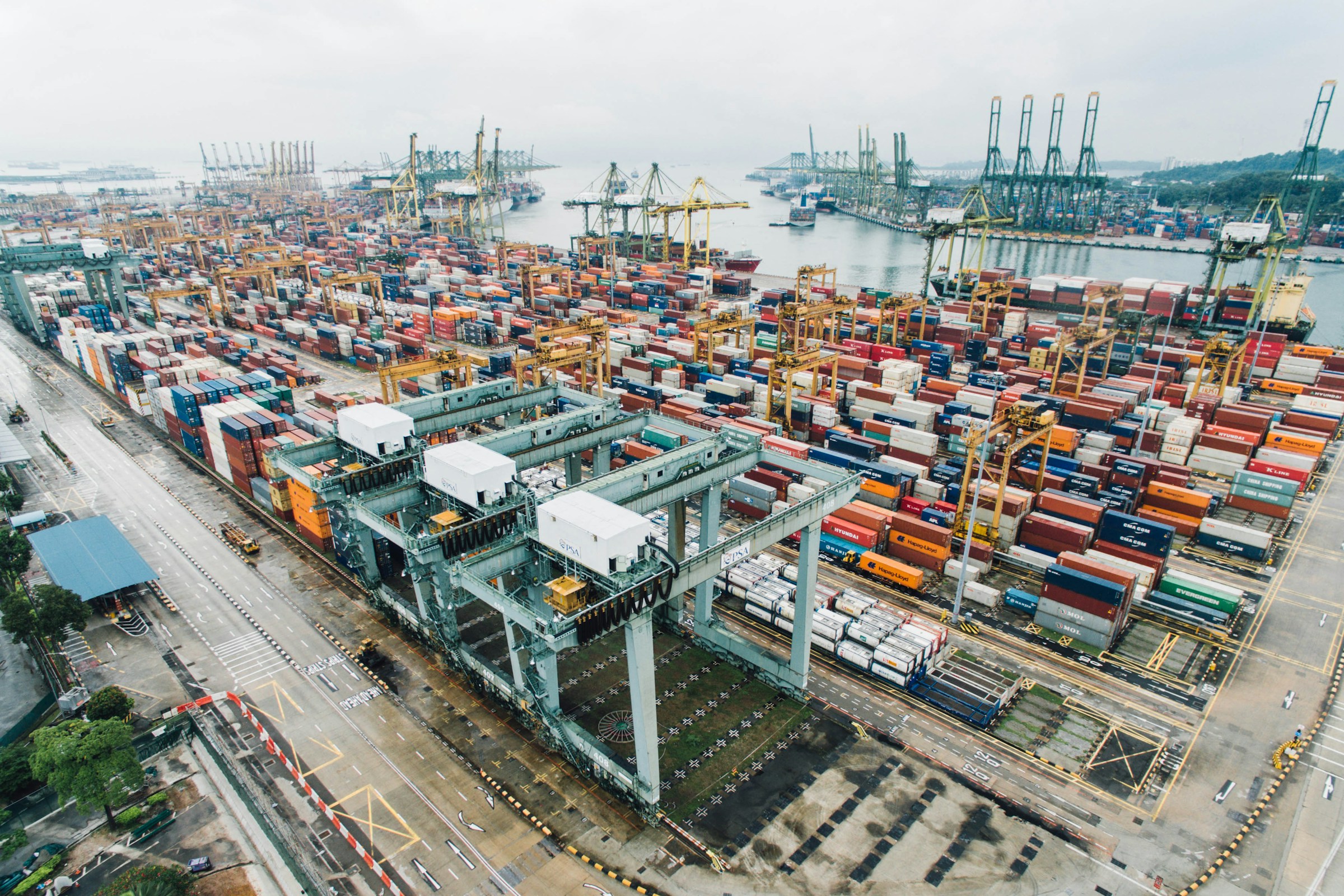 Representative aerial photograph of container freight and cranes at a seaport